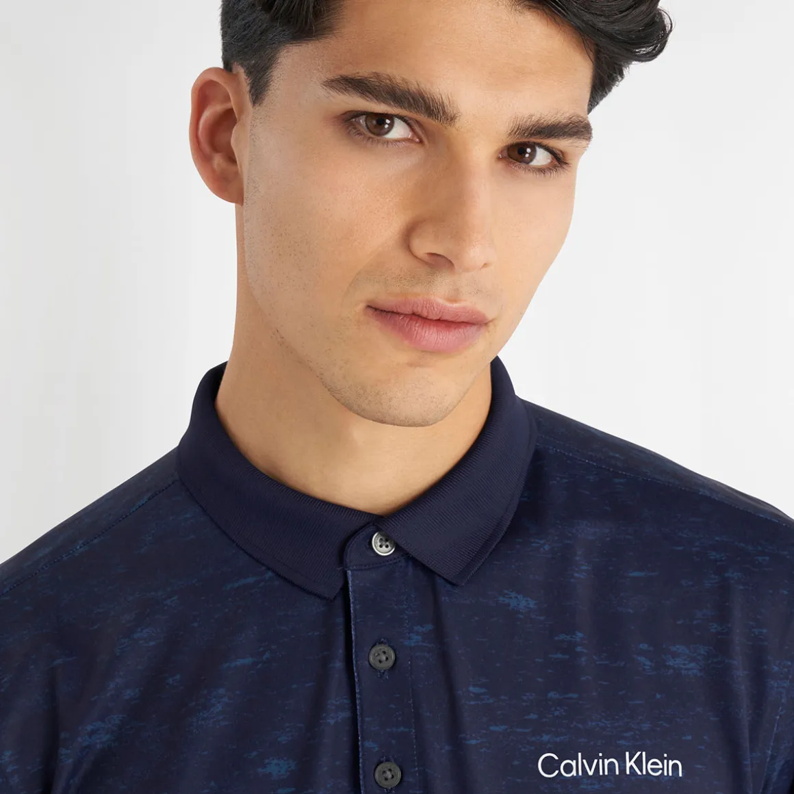 calvin_klein_mens_texture_2.webp Calvin Klein Men's Textured Slate Print Golf Polo Shirt
