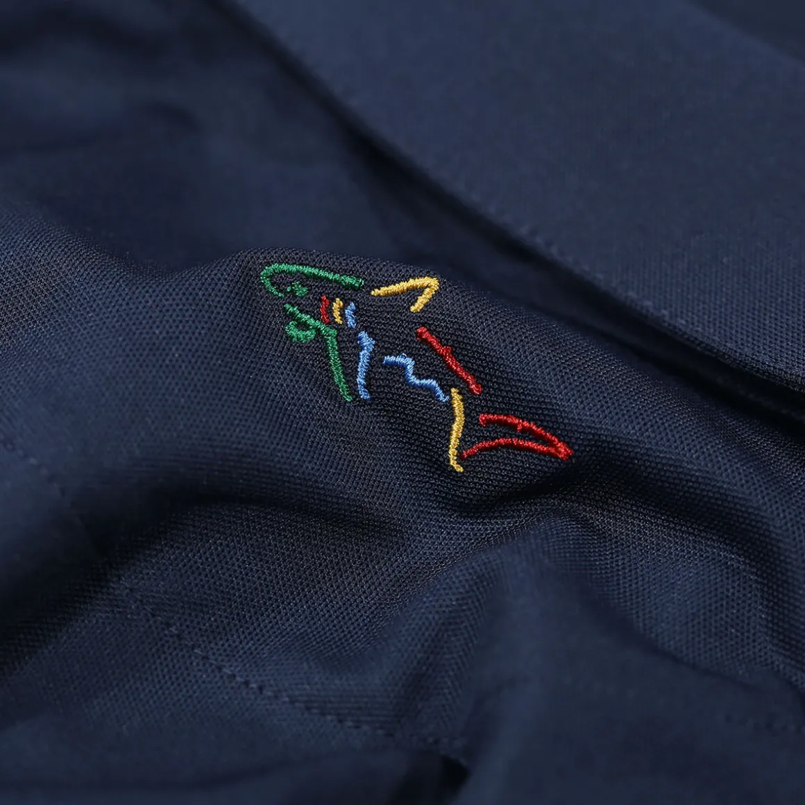 greg_norman_mens_neck_log_11-2.webp Greg Norman Men's Neck Logo Stretch Golf Polo Shirt
