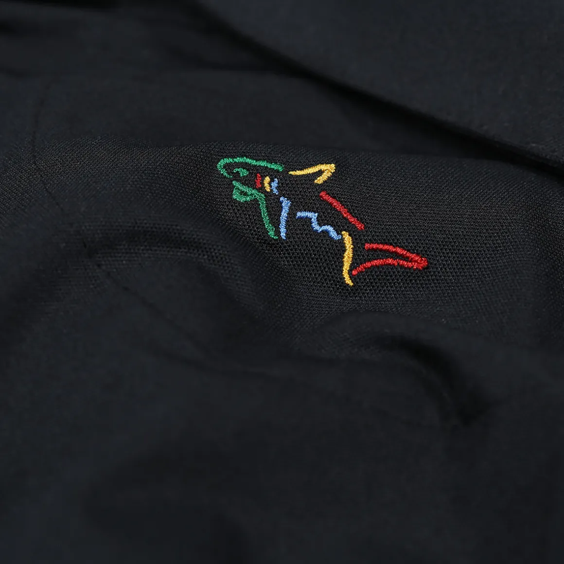 greg_norman_mens_neck_log_11-6.webp Greg Norman Men's Neck Logo Stretch Golf Polo Shirt