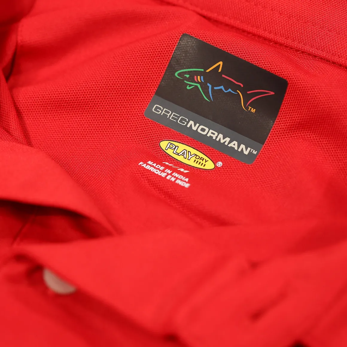 greg_norman_mens_neck_log_18-1.webp Greg Norman Men's Neck Logo Stretch Golf Polo Shirt