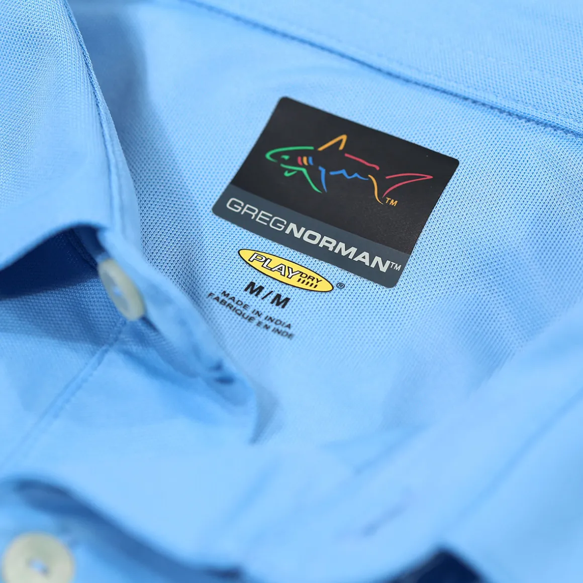 greg_norman_mens_neck_log_23-1.webp Greg Norman Men's Neck Logo Stretch Golf Polo Shirt