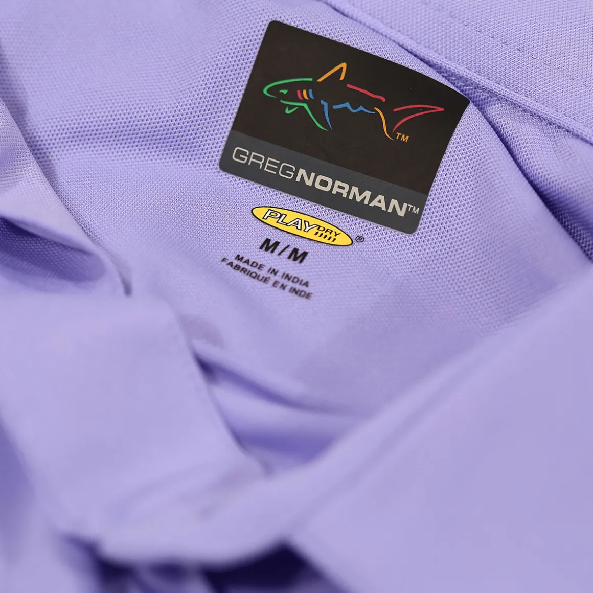 greg_norman_mens_neck_log_30-1.webp Greg Norman Men's Neck Logo Stretch Golf Polo Shirt