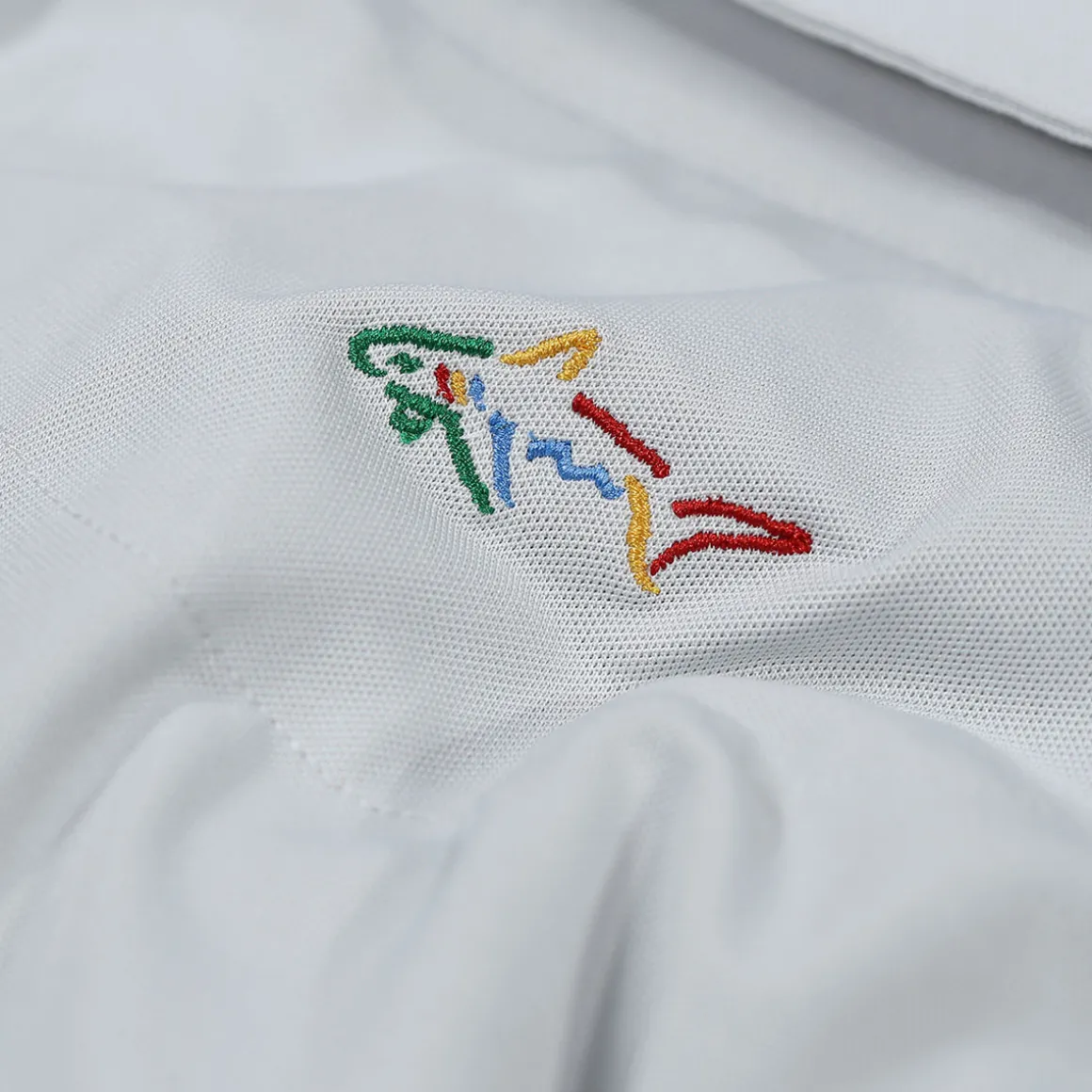 greg_norman_mens_neck_log_31-5.webp Greg Norman Men's Neck Logo Stretch Golf Polo Shirt
