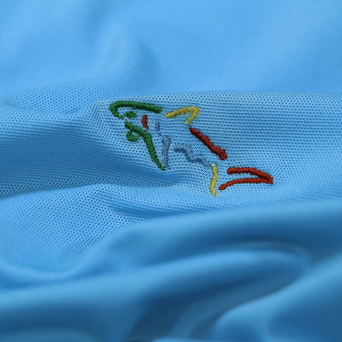 greg_norman_mens_shark_lo_4-5.webp Greg Norman Men's Shark Logo Golf Polo Shirt